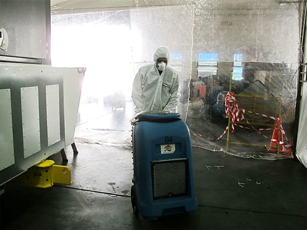 Technician working in containment