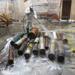 removing hazardous gas cylinders after explosion